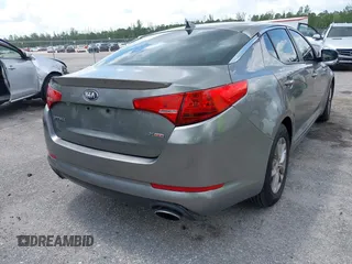 2013 Kia Optima LX z VIN 5XXGM4A70DG098148, wystawiony jako IAAI lot #42352296 z przebiegiem 162 702 mil mil oraz . Historia ofert i sprzedaży dostępna na DreamBid. Obrazek 14.