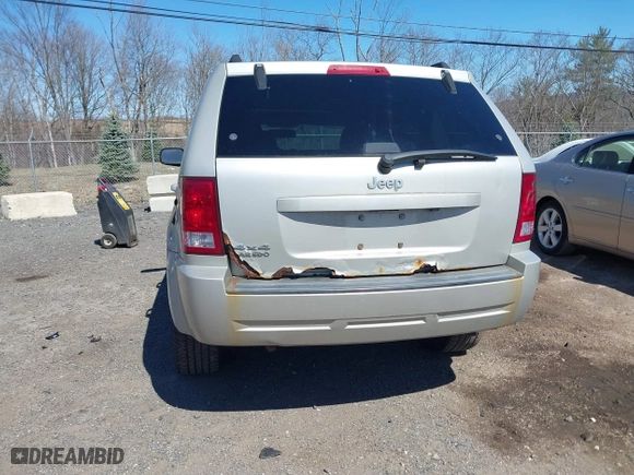 2010 Jeep Grand Cherokee Laredo with VIN 1J4PR4GK2AC125918, listed as a IAAI auction lot 41899078 with 236,229 mi miles. Bid and sale history available at carsss.com. Image 6.