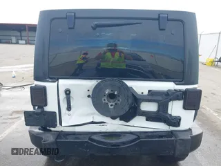 2013 Jeep Wrangler Unlimited Sport with VIN 1C4BJWDG4DL599151, listed as a IAAI auction lot 42212831 with 143,865 mi miles and . Bid and sale history available at DreamBid. Image 6.