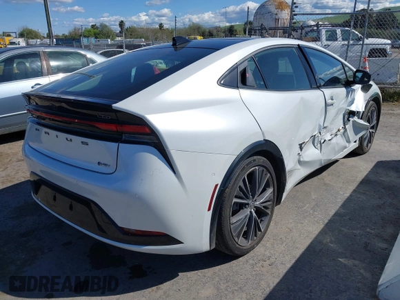2023 Toyota Prius LE with VIN JTDACAAUXP3012538, listed as a IAAI auction lot 41948103 with 33,338 mi miles and . Bid and sale history available at DreamBid. Image 4.