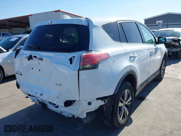 2018 Toyota RAV4 XLE z VIN 2T3WFREV3JW483398, wystawiony jako IAAI lot #41740776 z przebiegiem 70 640 mil mil oraz . Historia ofert i sprzedaży dostępna na DreamBid. Obrazek 4.