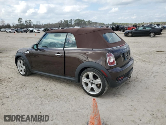 2011 MINI Convertible S with VIN WMWZP3C58BTX83725, listed as a Copart auction lot 44418965 with 45,401 mi miles and Salvage title. Bid and sale history available at DreamBid. Image 2.