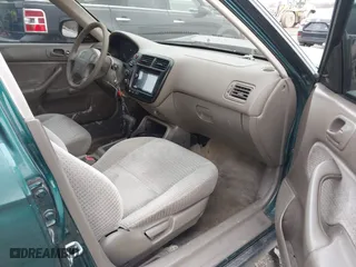 1999 Honda Civic VP with VIN 2HGEJ6617XH537283, listed as a IAAI auction lot 41483084 with 153,655 mi miles. Bid and sale history available at carsss.com. Image 5.