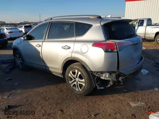 2017 Toyota RAV4 LE with VIN 2T3ZFREV3HW325229, listed as a IAAI auction lot 41290488 with 156,243 mi miles. Bid and sale history available at carsss.com. Image 3.