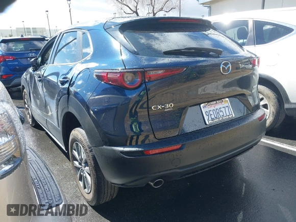 2023 Mazda CX-30 S with VIN 3MVDMBAM9PM541315, listed as a IAAI auction lot 41758162 with 46,296 mi miles and . Bid and sale history available at carsss.com. Image 3.