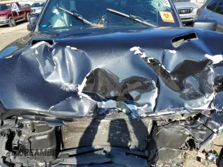 2015 Ram 1500 Rebel z VIN 1C6RR7YT7FS771791, wystawiony jako Copart lot #49873094 z przebiegiem 119 875 mil mil oraz Szkoda całkowita • Salvage title. Historia ofert i sprzedaży dostępna na DreamBid. Obrazek 11.