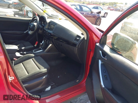 2015 Mazda CX-5 Touring with VIN JM3KE2CY5F0542184, listed as a IAAI auction lot 41770264 with 119,592 mi miles. Bid and sale history available at carsss.com. Image 5.