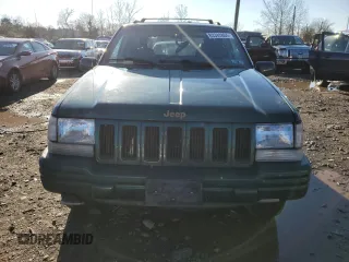 1997 Jeep Grand Cherokee Limited with VIN 1J4GZ78Y2VC728605, listed as a Copart auction lot 83342804 with 104,185 mi miles and Salvage Title. Bid and sale history available at carsss.com. Image 5.