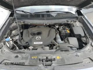 2019 Mazda CX-9 Grand Touring z VIN JM3TCADY9K0300284, wystawiony jako Copart lot #51801365 z przebiegiem 53 550 mil mil oraz Szkoda całkowita • Salvage title. Historia ofert i sprzedaży dostępna na DreamBid. Obrazek 12.