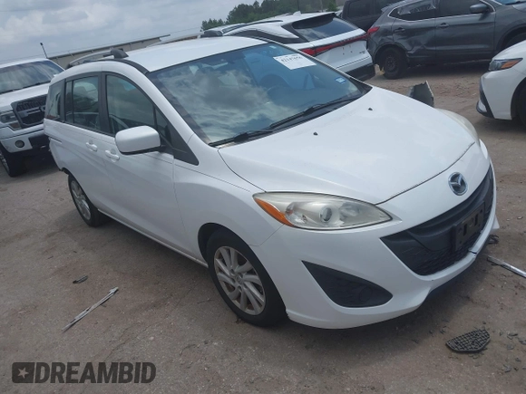 2012 Mazda 5 Sport with VIN JM1CW2BLXC0114770, listed as a IAAI auction lot 42147656 with 99,908 mi miles and . Bid and sale history available at DreamBid. Image 1.