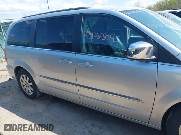 2011 Chrysler Town & Country Touring L with VIN 2A4RR8DG8BR797653, listed as a IAAI auction lot 42115304 with 185,613 mi miles and . Bid and sale history available at DreamBid. Image 13.