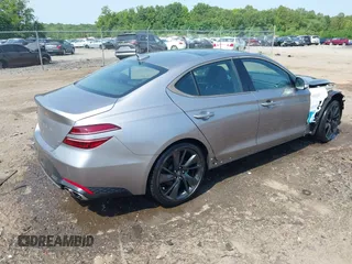 2023 Genesis G70 2.0T with VIN KMTG34TA2PU121151, listed as a IAAI auction lot 42425161 with 19,646 mi miles and . Bid and sale history available at DreamBid. Image 4.