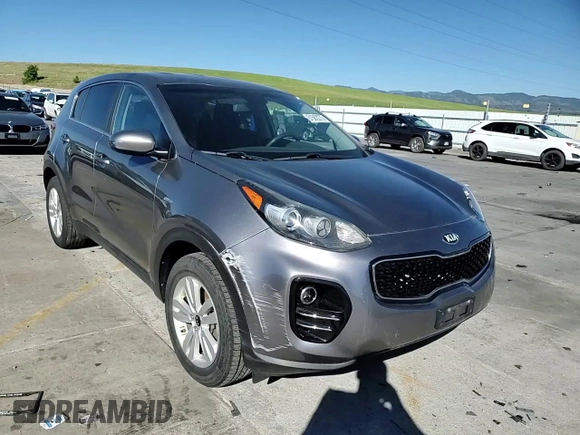 2018 Kia Sportage LX z VIN KNDPMCAC8J7330264, wystawiony jako Copart lot #61582275 z przebiegiem 93 201 mil mil oraz Czysty tytuł • Clean title. Historia ofert i sprzedaży dostępna na DreamBid. Obrazek 14.