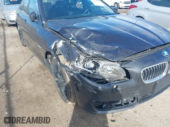 2014 BMW 5 Series 535i xDrive with VIN WBA5B3C52ED534784, listed as a IAAI auction lot 41875567 with 128,533 mi miles and . Bid and sale history available at carsss.com. Image 6.