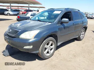 2004 Lexus RX 330 with VIN JTJGA31U340001595, listed as a IAAI auction lot 42125099 with 238,834 mi miles. Bid and sale history available at carsss.com. Image 2.