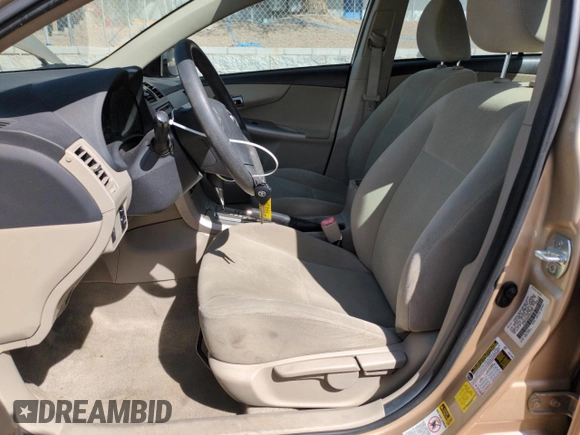 2012 Toyota Corolla L with VIN 5YFBU4EE6CP051067, listed as a Copart auction lot 52988715 with 816,251 mi miles and Salvage Title. Bid and sale history available at DreamBid. Image 7.