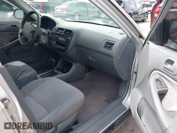 1999 Honda Civic LX with VIN JHMEJ6671XS003027, listed as a IAAI auction lot 41825146 with 197,764 mi miles and . Bid and sale history available at DreamBid. Image 5.