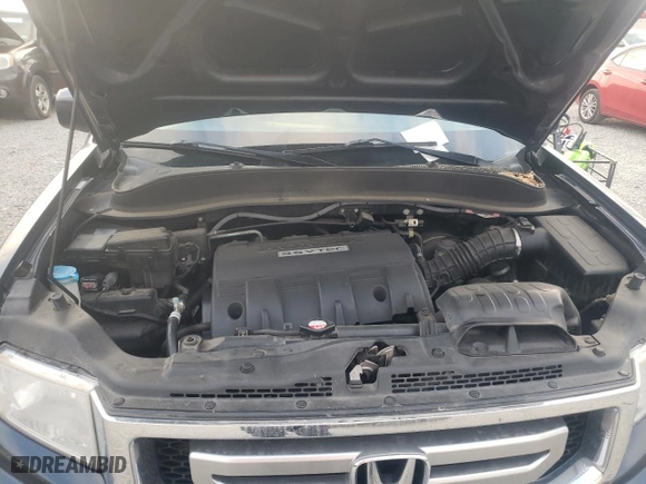 2010 Honda Ridgeline RTL with VIN 5FPYK1F54AB007811, listed as a Copart auction lot 51525785 with 154,922 mi miles and Salvage Title. Bid and sale history available at carsss.com. Image 11.