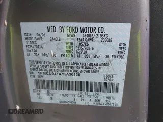 2007 Ford Escape Limited with VIN 1FMCU94147KA30136, listed as a IAAI auction lot 41896592 with 196,340 mi miles. Bid and sale history available at carsss.com. Image 9.