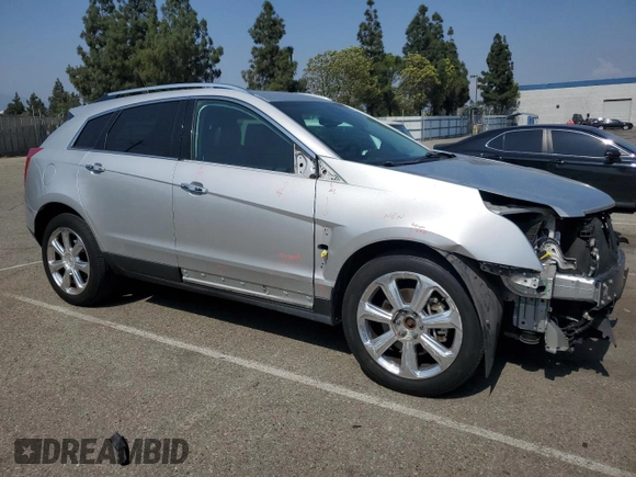 2013 Cadillac SRX Performance Collection z VIN 3GYFNDE38DS561321, wystawiony jako Copart lot #60237605 z przebiegiem 120 404 mil mil oraz Szkoda całkowita • Salvage title. Historia ofert i sprzedaży dostępna na DreamBid. Obrazek 4.