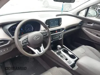 2020 Hyundai Santa Fe SE with VIN 5NMS23AD8LH285363, listed as a IAAI auction lot 42408647 with 60,058 mi miles and . Bid and sale history available at DreamBid. Image 20.