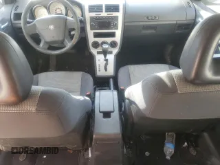 2009 Dodge Caliber SXT z VIN 1B3HB48A59D104136, wystawiony jako Copart lot #45971285 z przebiegiem 291 374 mil mil oraz Szkody całkowita. Historia ofert i sprzedaży dostępna na DreamBid. Obrazek 8.