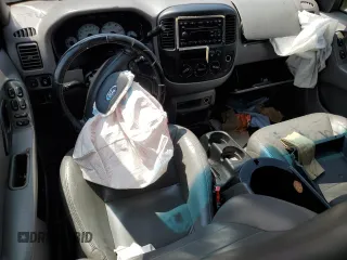 2002 Ford Escape XLT Choice с VIN 1FMYU03152KC71778, выставлен на аукционе Copart как лот 61072285 с пробегом Не указан миль и Списание • Salvage title. История ставок и продаж доступна на DreamBid. Изображение 8.