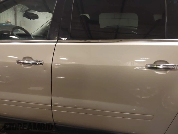 2016 Chevrolet Traverse LT with VIN 1GNKVGKD5GJ267827, listed as a IAAI auction lot 41962344 with 206,806 mi miles and . Bid and sale history available at DreamBid. Image 12.