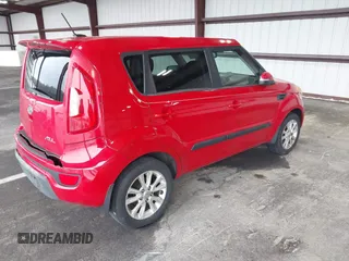 2012 Kia Soul + with VIN KNDJT2A69C7432852, listed as a IAAI auction lot 41960420 with 298,565 mi miles. Bid and sale history available at carsss.com. Image 4.