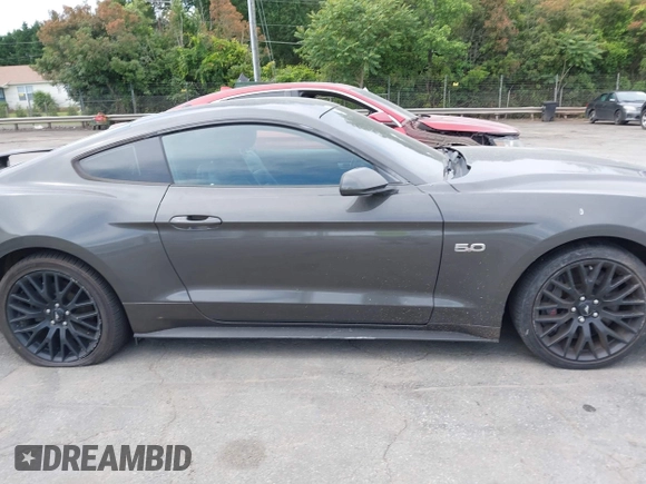 2019 Ford Mustang GT with VIN 1FA6P8CF0K5124320, listed as a IAAI auction lot 42314129 with 102,589 mi miles and . Bid and sale history available at DreamBid. Image 13.