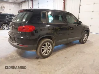 2014 Volkswagen Tiguan SE z VIN WVGAV3AX9EW614094, wystawiony jako IAAI lot #42350601 z przebiegiem 128 996 mil mil oraz . Historia ofert i sprzedaży dostępna na DreamBid. Obrazek 4.