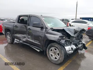 2014 Toyota Tundra SR5 z VIN 5TFEM5F16EX082421, wystawiony jako IAAI lot #40735426 z przebiegiem 173 005 mil mil oraz . Historia ofert i sprzedaży dostępna na DreamBid. Obrazek 1.