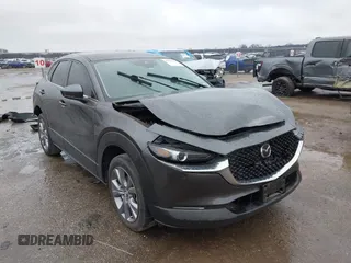 2021 Mazda CX-30 Select with VIN 3MVDMABL9MM272440, listed as a IAAI auction lot 41538691 with 55,069 mi miles and . Bid and sale history available at carsss.com. Image 1.