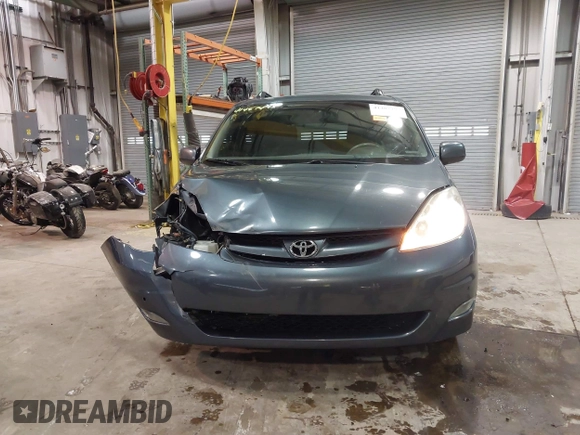 2010 Toyota Sienna XLE with VIN 5TDYK4CC2AS309994, listed as a IAAI auction lot 41487495 with 0 mi miles. Bid and sale history available at carsss.com. Image 12.