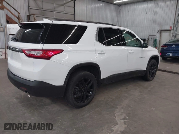 2021 Chevrolet Traverse LT Cloth with VIN 1GNERGKW1MJ206196, listed as a IAAI auction lot 41946973 with 70,630 mi miles. Bid and sale history available at carsss.com. Image 4.