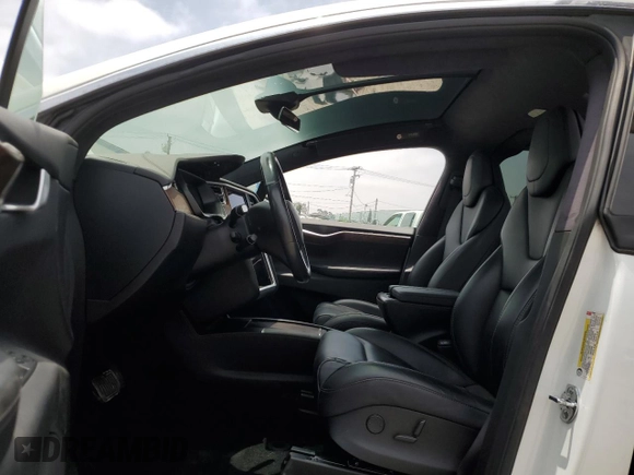 2017 Tesla Model X 90D with VIN 5YJXCAE26HF079421, listed as a Copart auction lot 47889005 with 88,281 mi miles and Salvage Title. Bid and sale history available at DreamBid. Image 7.