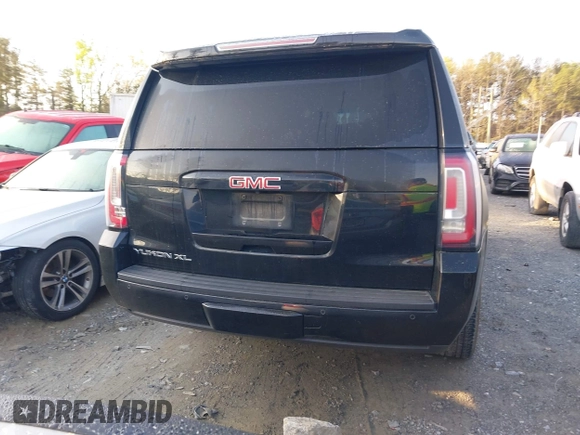 2016 GMC Yukon XL SLE with VIN 1GKS1FKC6GR140418, listed as a IAAI auction lot 41843064 with 155,472 mi miles. Bid and sale history available at carsss.com. Image 16.