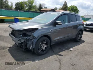 2015 Ford Escape Titanium with VIN 1FMCU9J98FUB49112, listed as a Copart auction lot 58989915 with 94,060 mi miles and Salvage title. Bid and sale history available at DreamBid. Image 1.