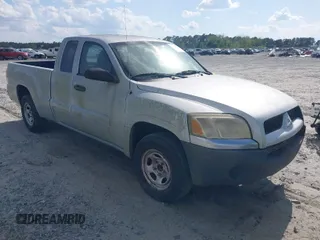 2007 Mitsubishi Raider LS with VIN 1Z7HC22K57S162987, listed as a IAAI auction lot 42015748 with 100,919 mi miles. Bid and sale history available at carsss.com. Image 1.