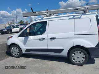 2022 Ford Transit Connect XL z VIN NM0LS6S23N1524833, wystawiony jako IAAI lot #41934592 z przebiegiem 53 532 mil mil oraz . Historia ofert i sprzedaży dostępna na DreamBid. Obrazek 14.