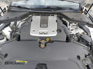 2014 Infiniti Q50 Premium z VIN JN1BV7APXEM670656, wystawiony jako IAAI lot #42085636 z przebiegiem 88 147 mil mil oraz . Historia ofert i sprzedaży dostępna na DreamBid. Obrazek 10.