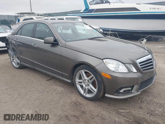 2011 Mercedes-Benz E-Class E 350 Luxury with VIN WDDHF8HB3BA348741, listed as a IAAI auction lot 41424618 with 117,306 mi miles. Bid and sale history available at carsss.com. Image 1.