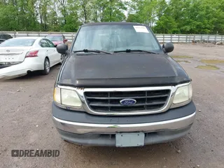 2003 Ford F-150 XL with VIN 1FTRX17263NA23449, listed as a IAAI auction lot 42111505 with 1 mi miles. Bid and sale history available at carsss.com. Image 6.