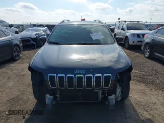2020 Jeep Cherokee Altitude with VIN 1C4PJLLB5LD580742, listed as a IAAI auction lot 41483128 with 77,127 mi miles. Bid and sale history available at carsss.com. Image 13.