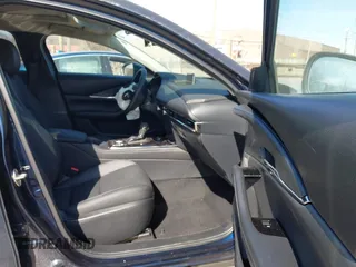 2024 Mazda CX-30 S Preferred with VIN 3MVDMBCM2RM720246, listed as a IAAI auction lot 41800330 with 6,743 mi miles and . Bid and sale history available at DreamBid. Image 5.