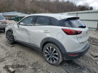 2019 Mazda CX-3 Touring with VIN JM1DKFC78K0405131, listed as a Copart auction lot 87065614 with 91,091 mi miles and Salvage Title. Bid and sale history available at carsss.com. Image 2.