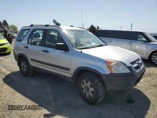 2002 Honda CR-V LX with VIN JHLRD68412C025791, listed as a Copart auction lot 52628115 with 240,923 mi miles and Clean Title. Bid and sale history available at carsss.com. Image 4.