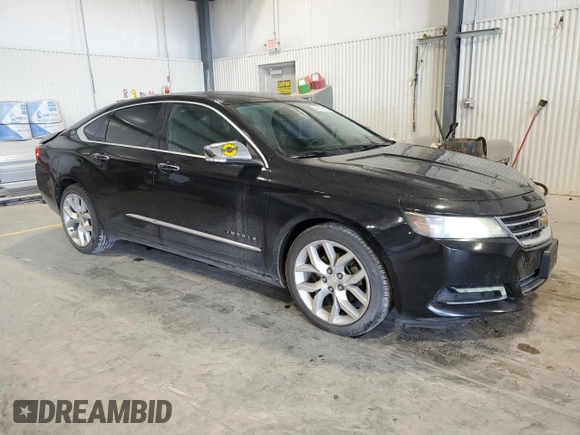 2015 Chevrolet Impala LTZ with VIN 2G1155SLXF9128621, listed as a Copart auction lot 44019405 with 137,536 mi miles and Clean Title. Bid and sale history available at DreamBid. Image 4.