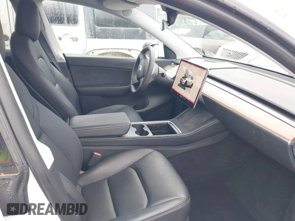 2022 Tesla Model Y Long Range with VIN 7SAYGDEE6NF461788, listed as a IAAI auction lot 41697064 with 34,034 mi miles and . Bid and sale history available at carsss.com. Image 5.