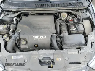 2018 Ford Taurus SHO с VIN 1FAHP2KT4JG127026, выставлен на аукционе Copart как лот 57410715 с пробегом 56 728 миль миль и Списание • Salvage title. История ставок и продаж доступна на DreamBid. Изображение 11.